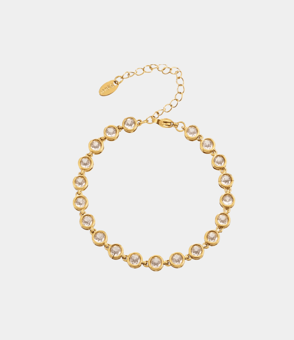 VIVIAN BRACELET IN WHITE, gold-tone chain bracelet with a row of round clear stones in bezel settings and an adjustable clasp.