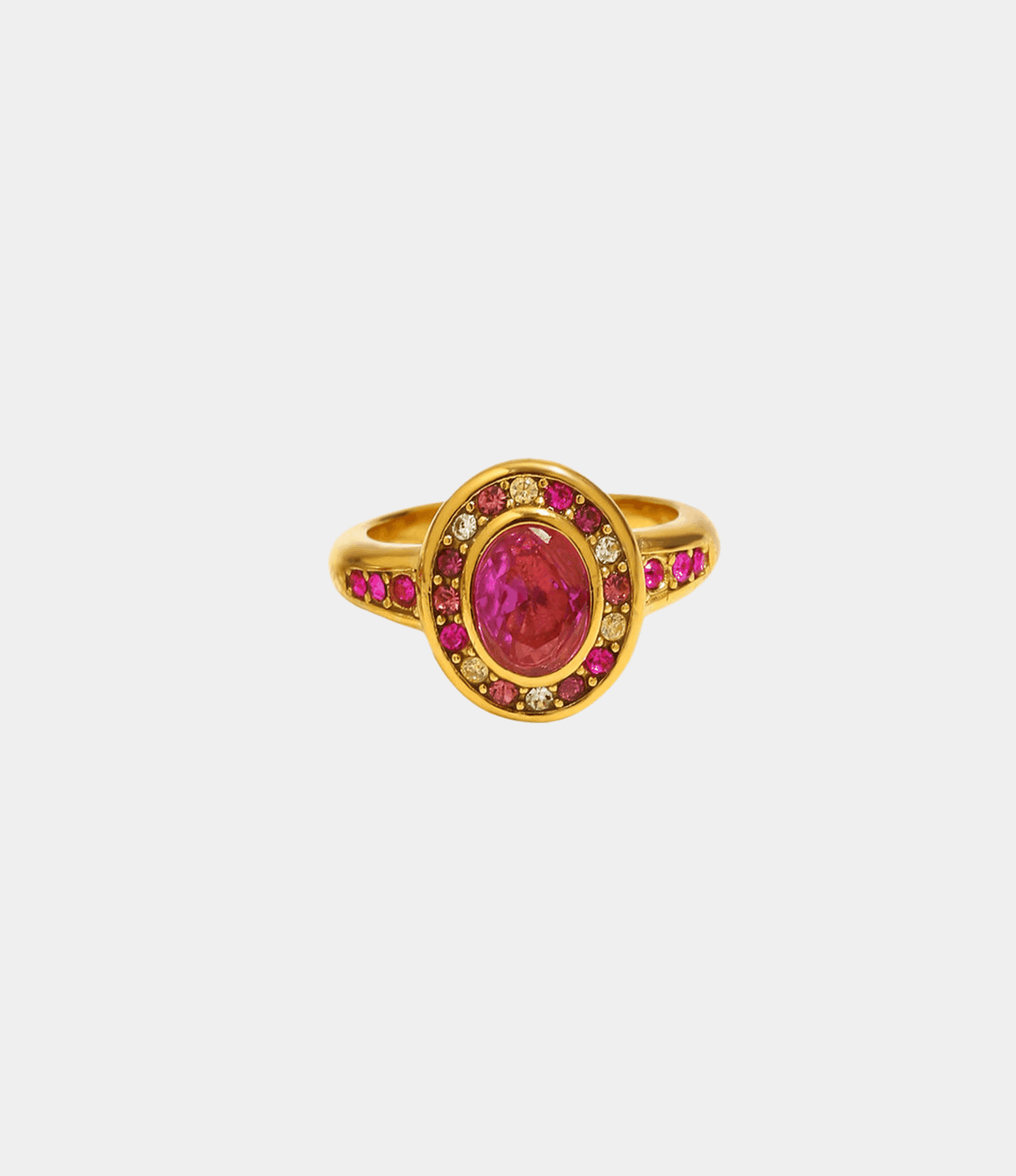 MINETTE RING in gold-tone metal, featuring an oval magenta center stone framed by pink and clear gems.