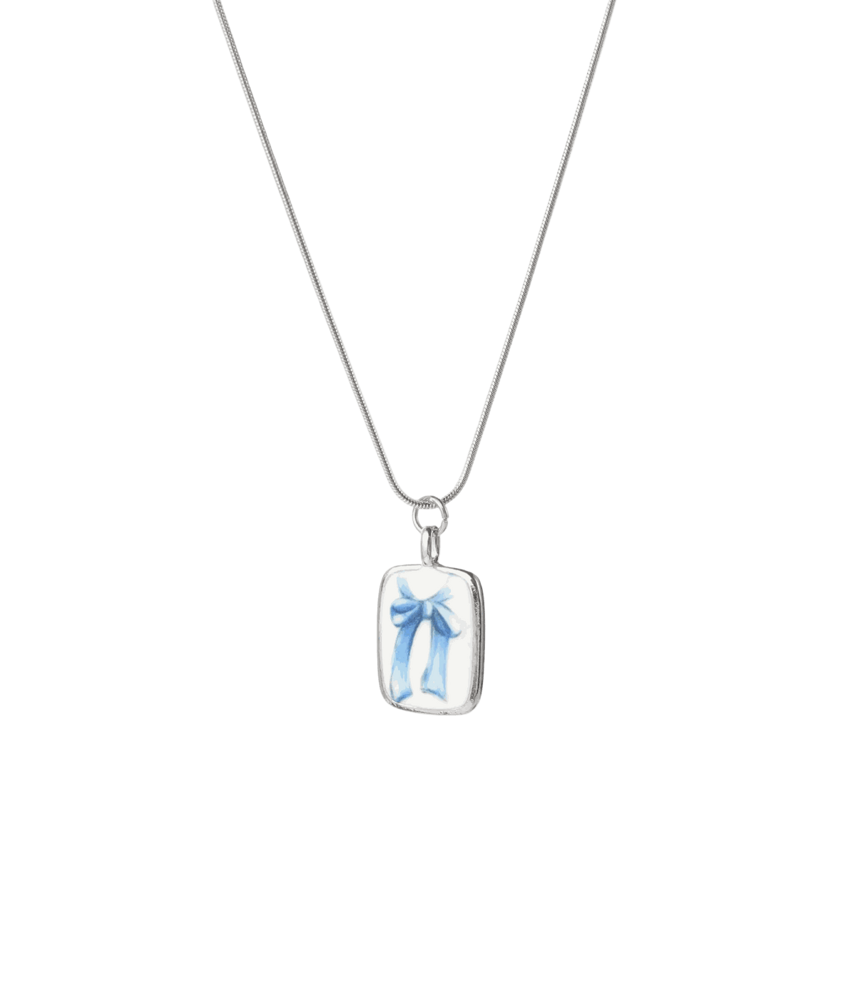 BOW CHARM NECKLACE with a silver-tone chain and rectangular charm featuring a blue ribbon bow design