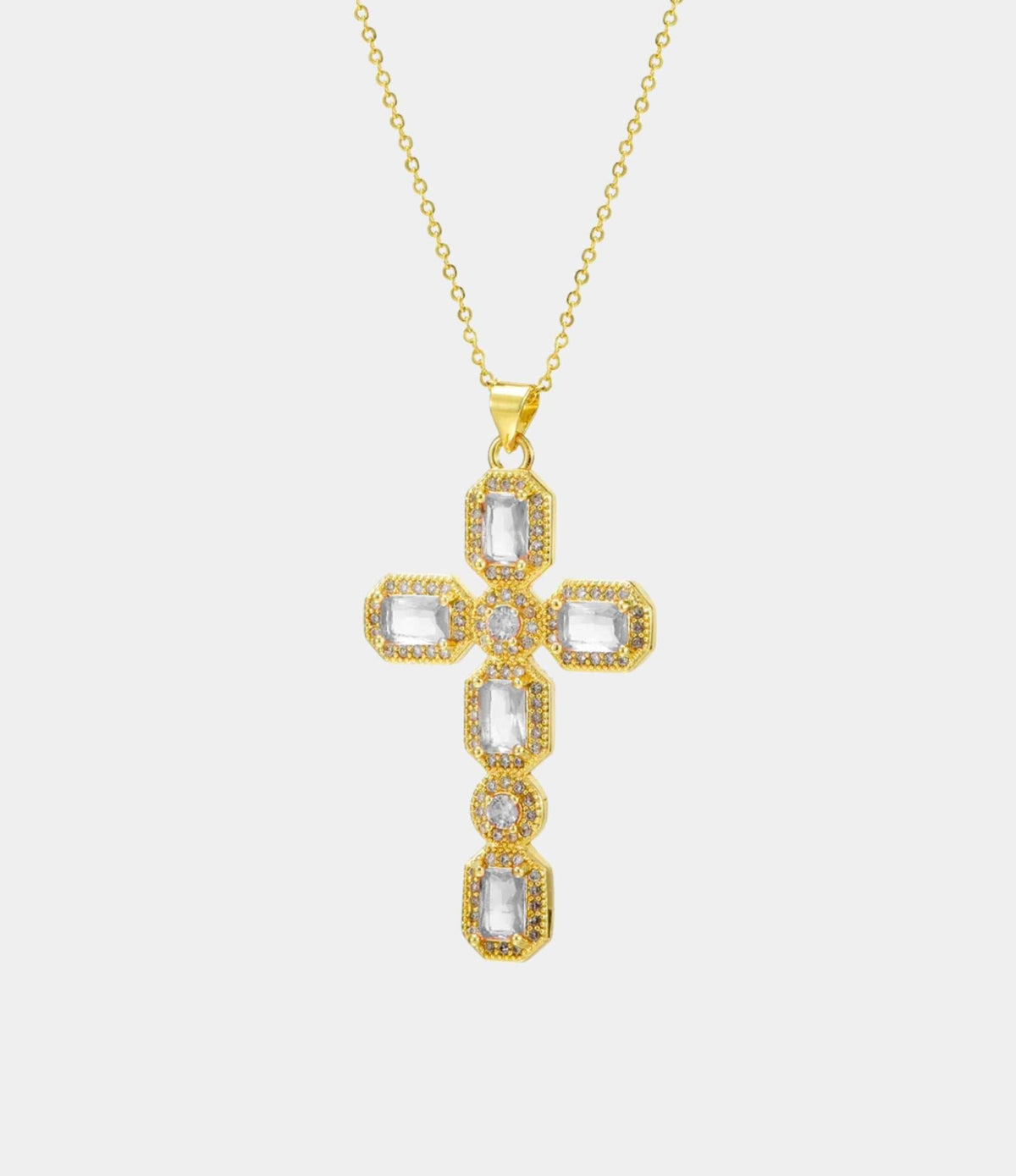 Amara Cross Necklace in White, gold-tone chain with a crystal-embellished cross pendant featuring clear stones.