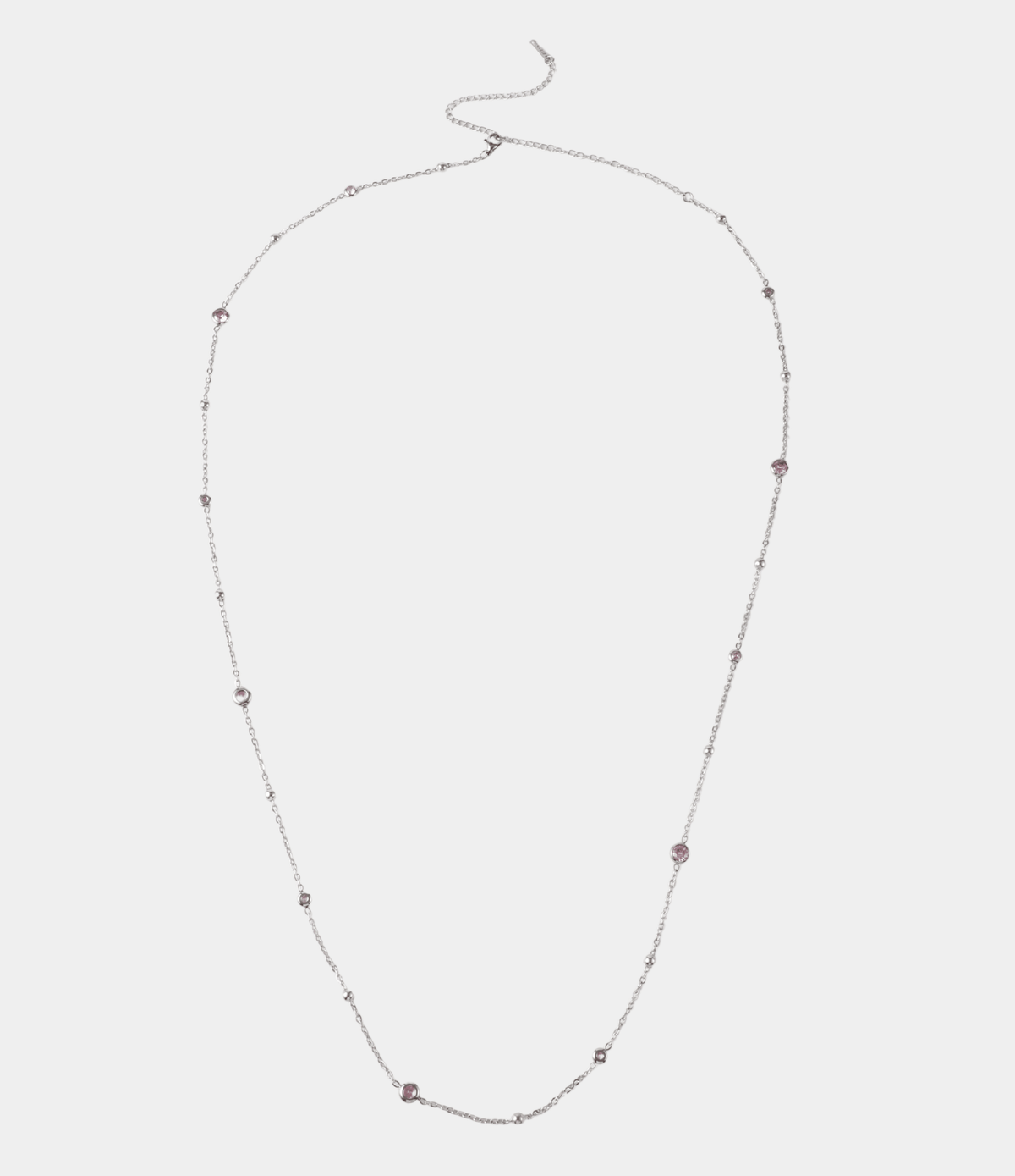 Waist chain, silver-toned PVD plated stainless steel with spaced pink zirconia accents. Angelina Waist Chain - PVD plated stainless steel and pink zirconia