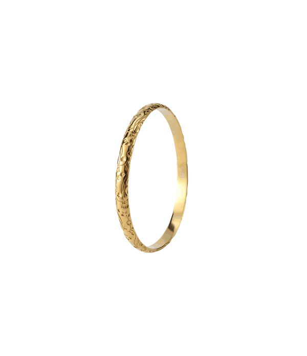 EDEN BANGLE - Stainless Steel Bangle in gold-tone metal, with a slim circular shape and engraved floral detailing.