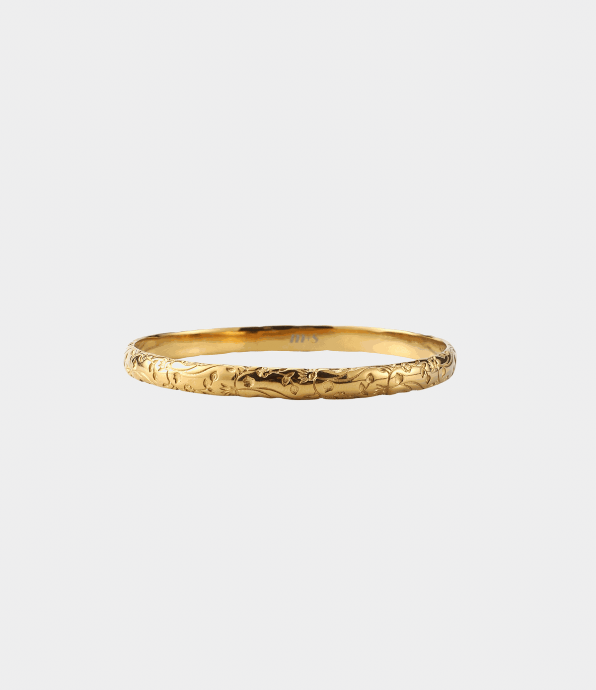 EDEN BANGLE - Stainless Steel Bangle, gold-tone metal with an engraved floral pattern encircling its slim band