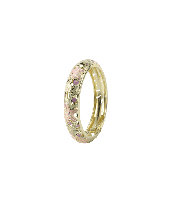 MERMAIDIA BANGLE IN FLOWER DUST, gold-tone bangle with pale pink enamel floral details and small gem accents.