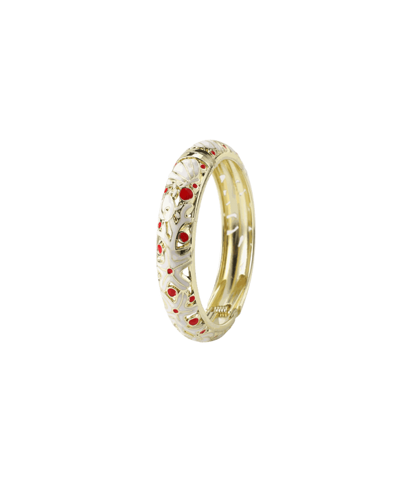 MERMAIDIA BANGLE IN WHITE, gold-tone metal with white enamel, ornate openwork and red jewel-like accents.