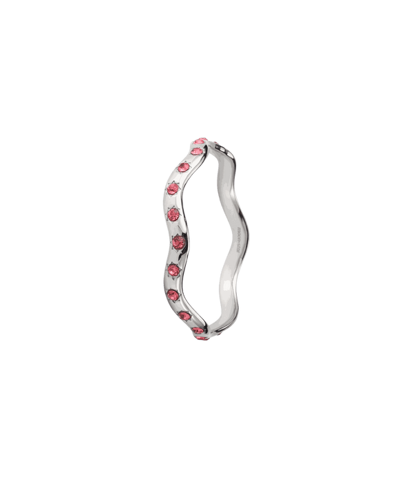 Wavy silver-tone bangle with pink stones along one edge; Miranda Bangle - Gold plated bangle with pink zirconia.