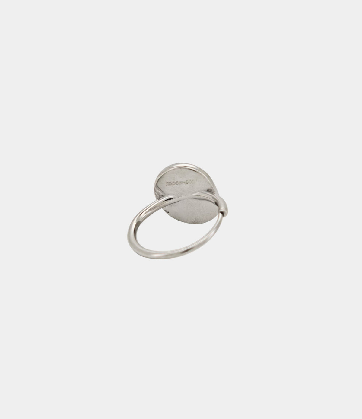Moon Sonnet Ring in Pink features a silver-toned sculptural band and a smooth round disc, with no pink stone visible
