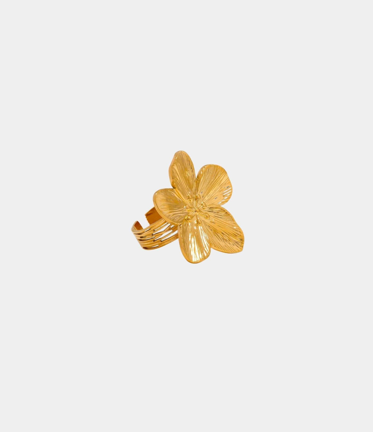 Orchid Affair Ring, a gold-tone stainless steel statement ring with a large sculpted flower and textured petals.
