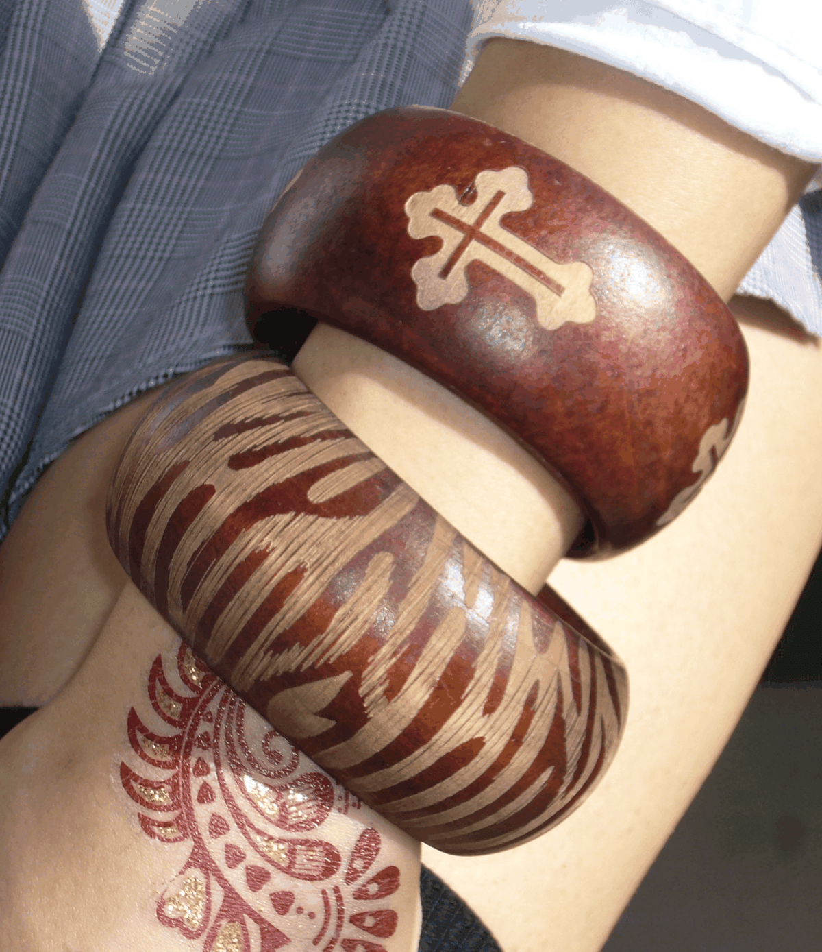 Savannah Wood Bangle, a chunky auburn wooden bracelet with a bold brown-and-cream zebra stripe pattern