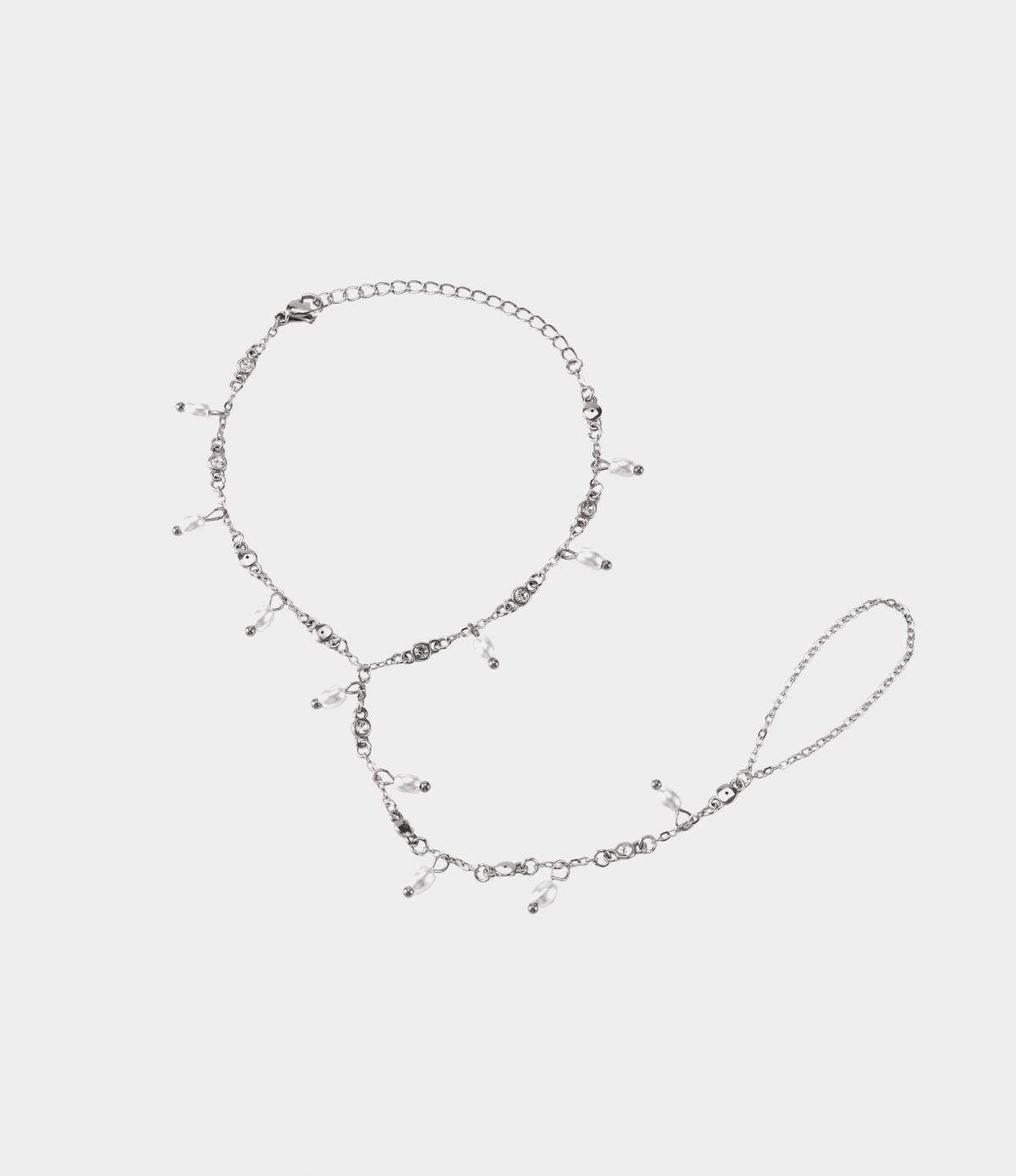 SHIMMER PEARL HAND CHAIN in silver-tone metal, with delicate chain links and small dangling pearl accents.