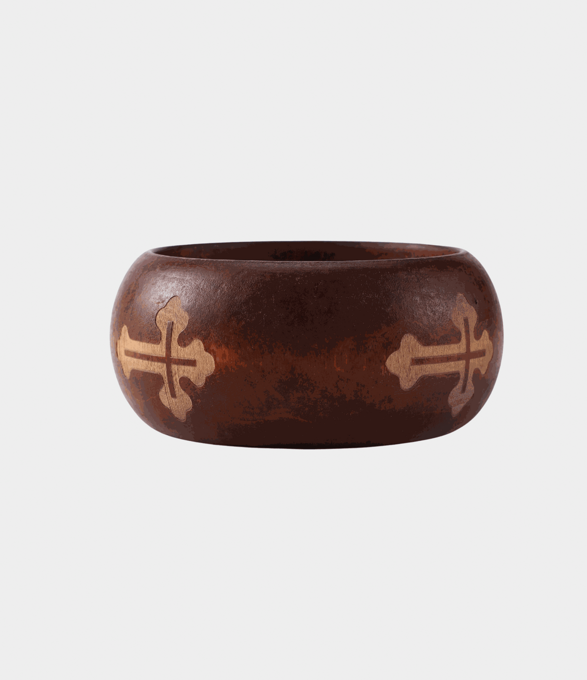 SIENNA WOOD BANGLE in dark auburn wood, chunky rounded design with engraved tan cross motifs around the band.