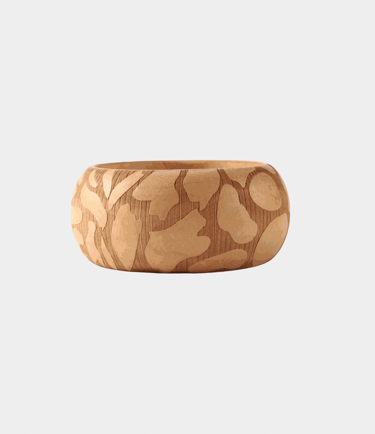 Sierra Wood Bangle, chunky natural wood bracelet in warm tan with an irregular darker organic pattern and rounded shape