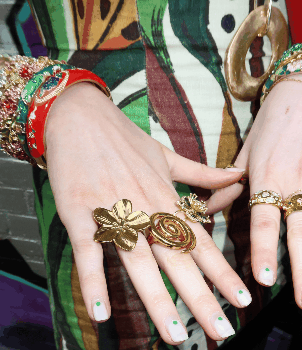Venice Enamel Bangle in Red - Chinese cloisonné bangle with bright red enamel, intricate floral details and gold-toned edges.