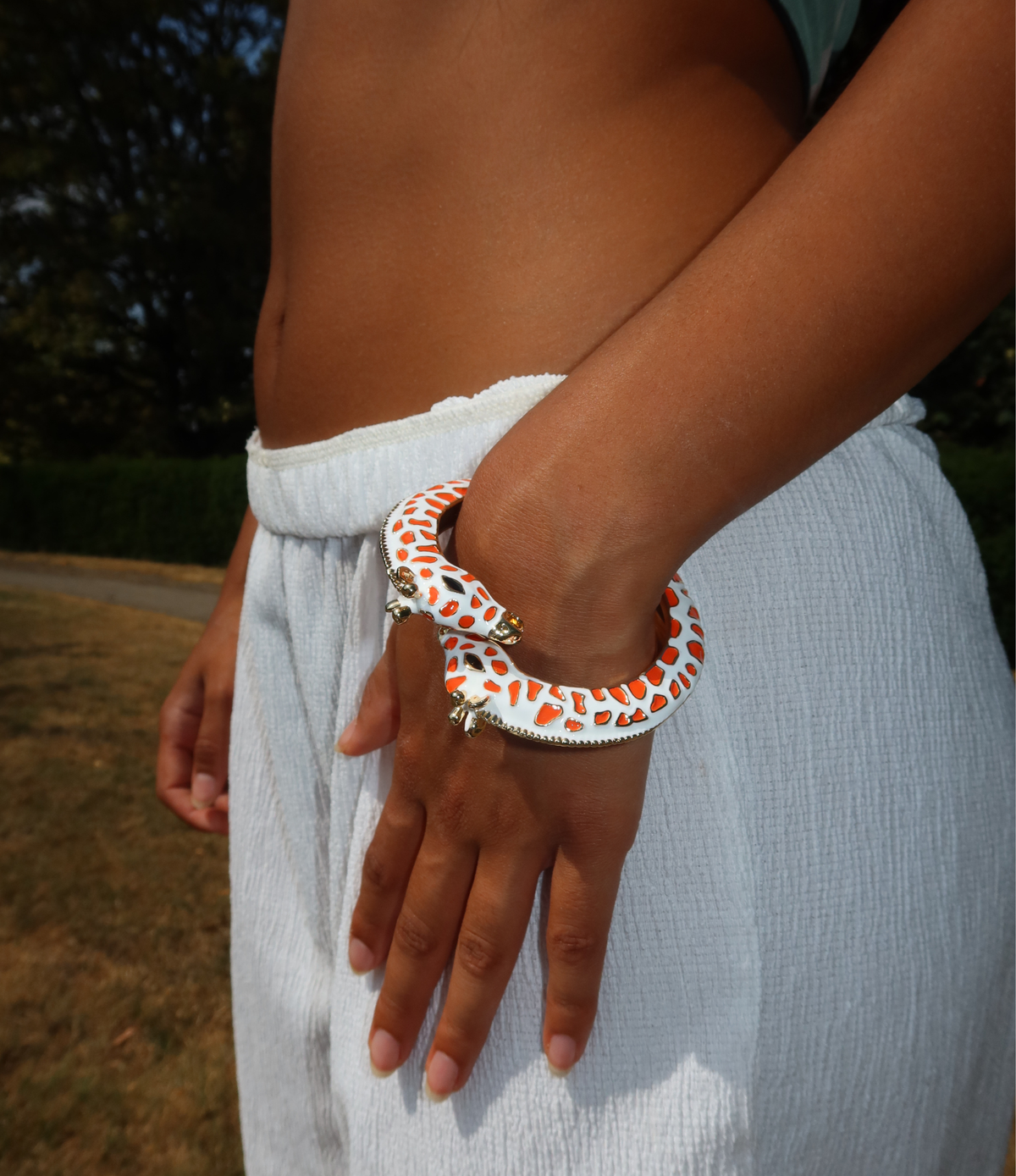 GIRAFFE BANGLE IN ORANGE