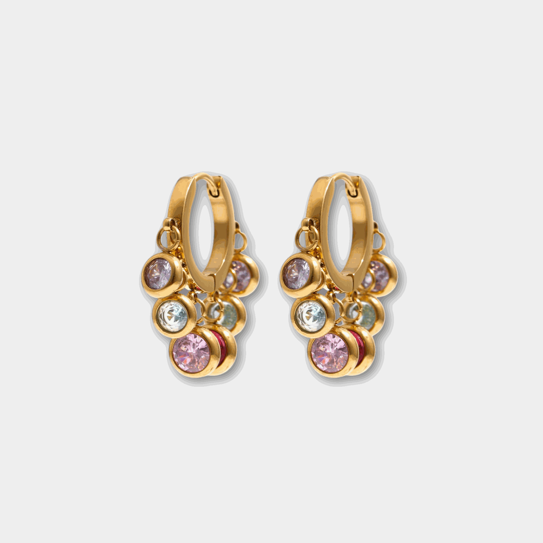 Aurora Hoops in Multicolour, gold-tone hoops with dangling round charms in pink, clear and iridescent hues.