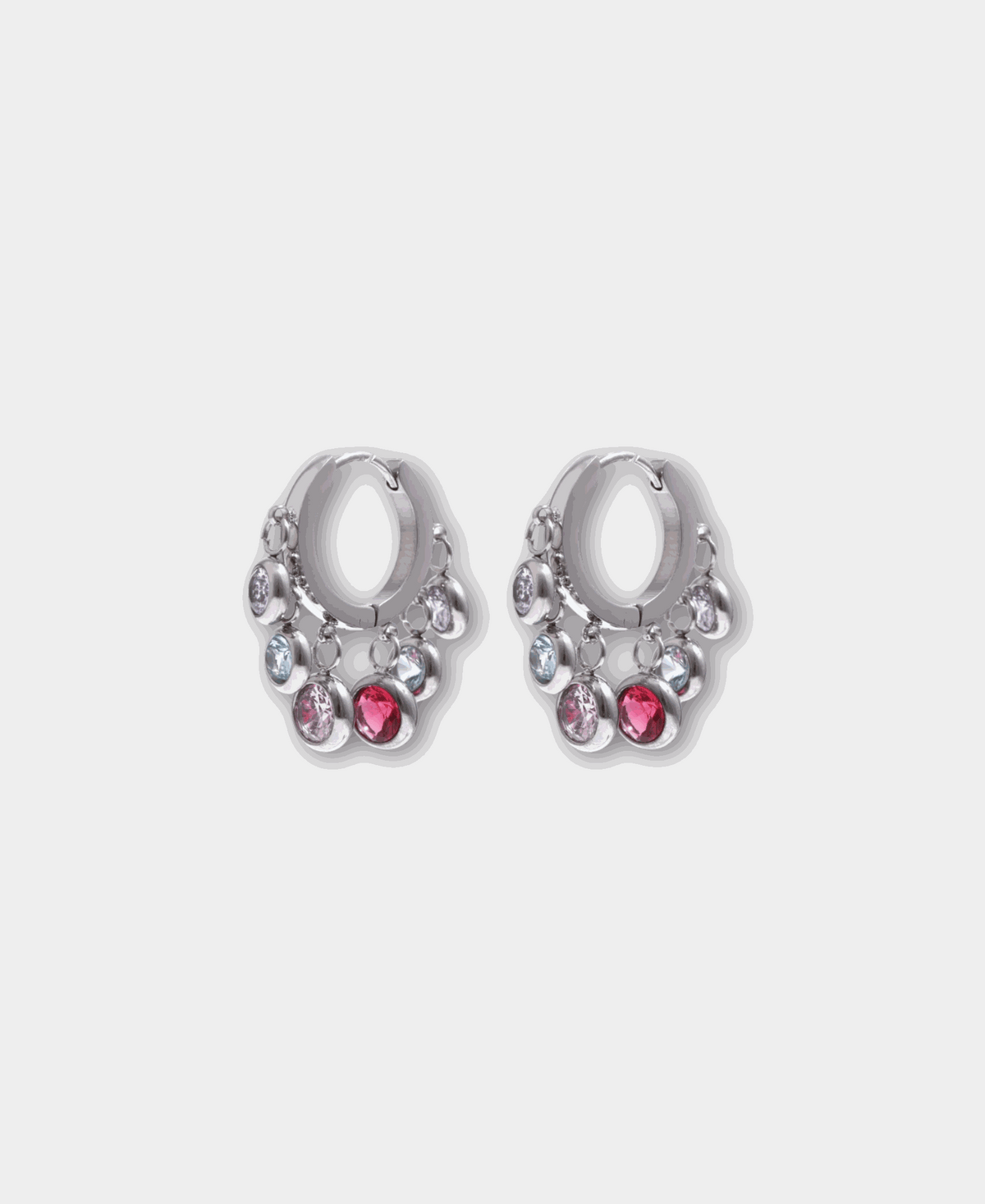 Aurora Hoops in Multicolour, silver-tone metal hoops with dangling clear, pale blue and pink gem charms.