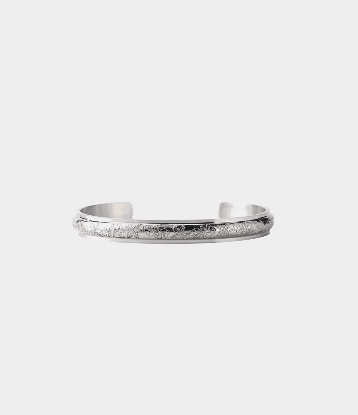 Azura Bangle - Stainless Steel Bangle in silver-tone metal with a slim open cuff and delicate engraved butterfly pattern around the band.