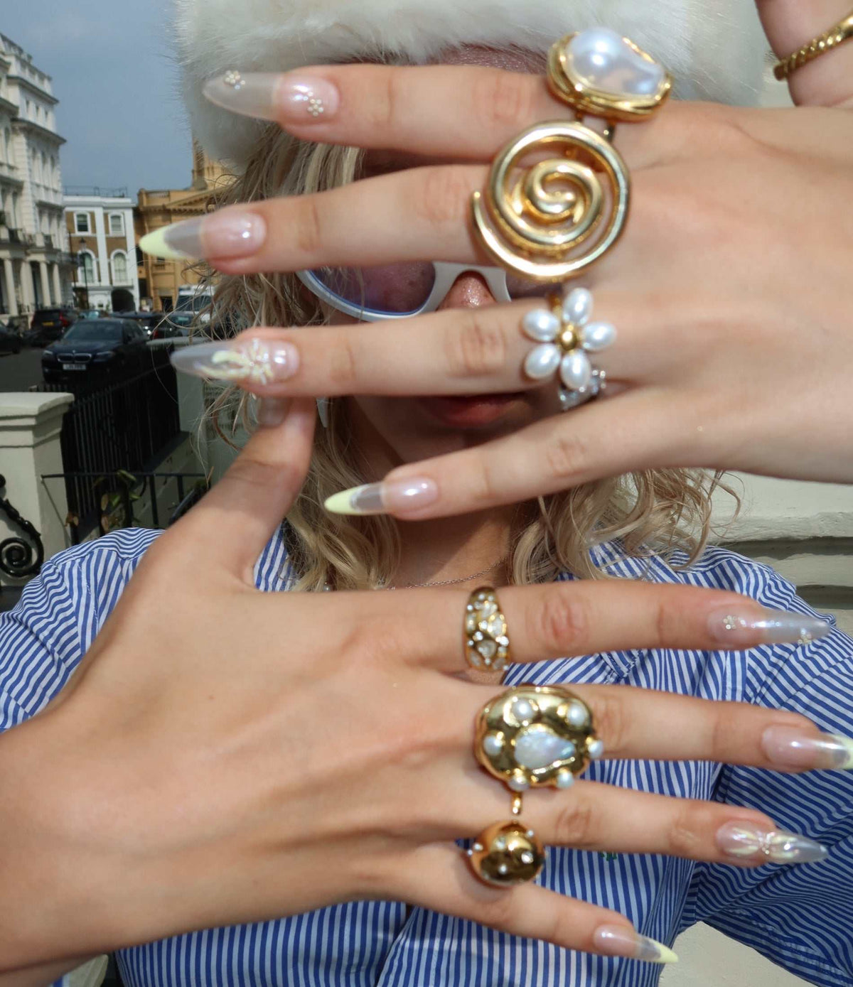 Baroque Pearl Ring with a large irregular white pearl in a polished gold-tone setting, worn as a statement piece.