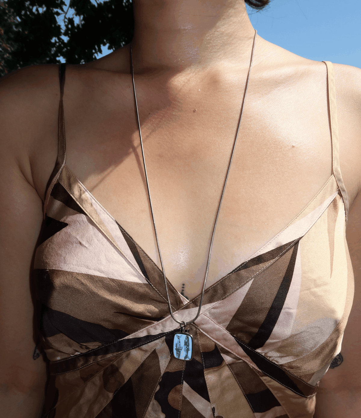 Fish Charm Necklace - Long necklace 70cm chain, silver-toned fine chain with a small blue illustrated fish charm.