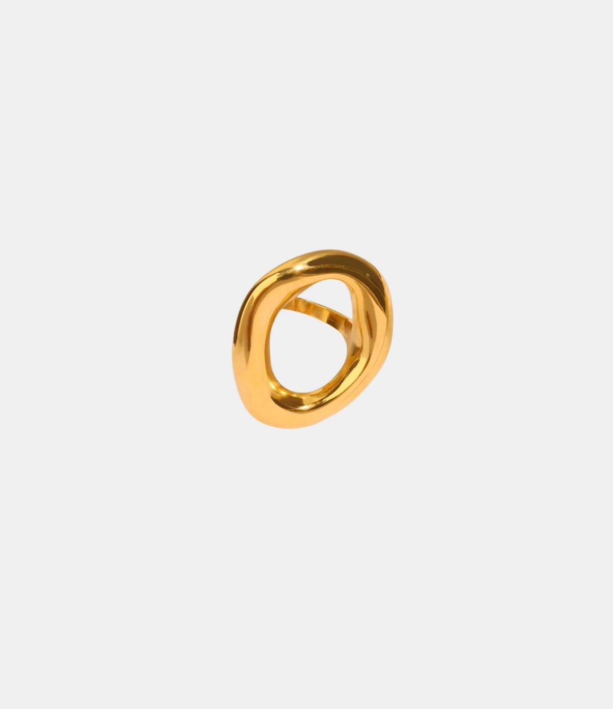 Gilded Gala Ring with a polished gold-tone finish, featuring a bold sculptural loop and open center.