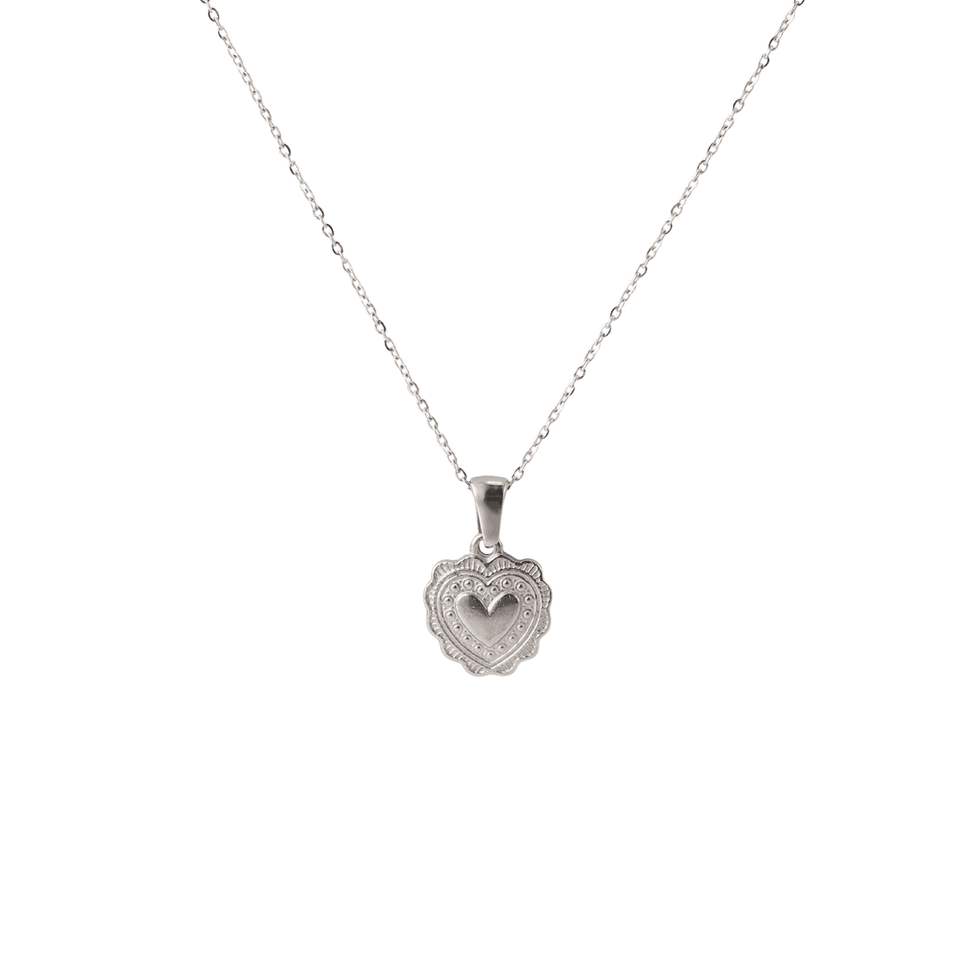 JULIETTE NECKLACE in silver-tone metal, with a fine chain and ornate heart-shaped pendant featuring a central heart cutout.