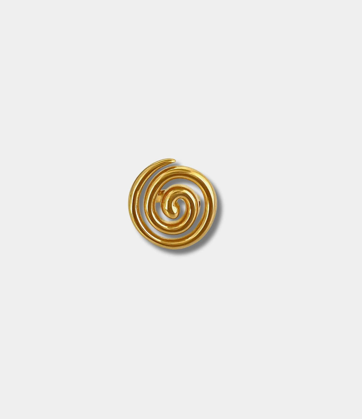 Molly Ring XL gold-tone ring with a polished metal finish and bold, oversized spiral swirl design.