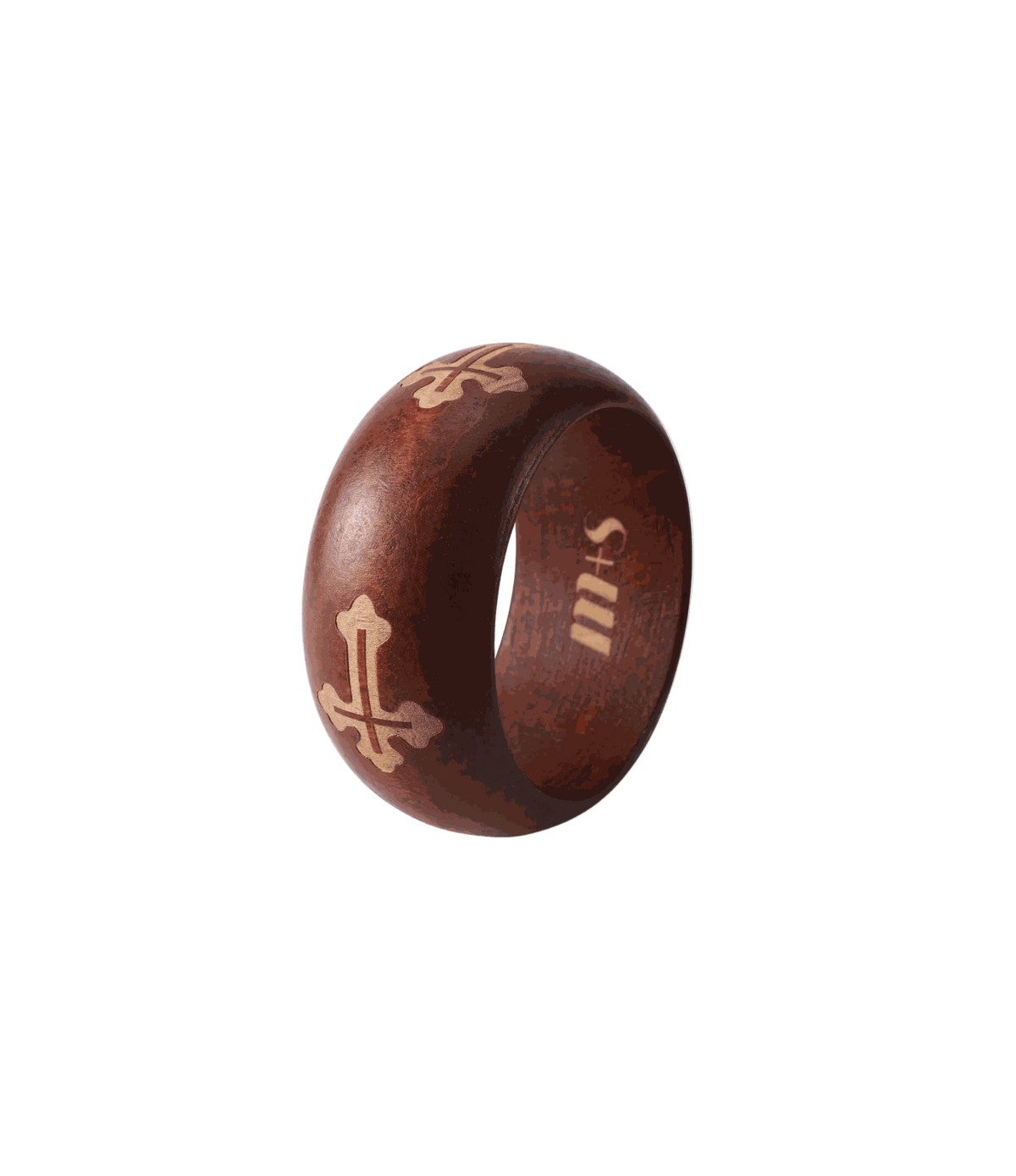 SIENNA WOOD BANGLE in dark reddish-brown wood, with a chunky shape and light engraved cross motifs.