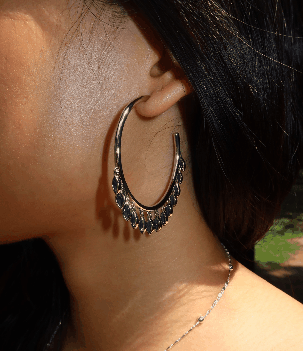 Vivian Earrings In Blue - 18ct Gold Plated Chunky hoop earrings with dangle details, gold-tone hoop with dark blue drops